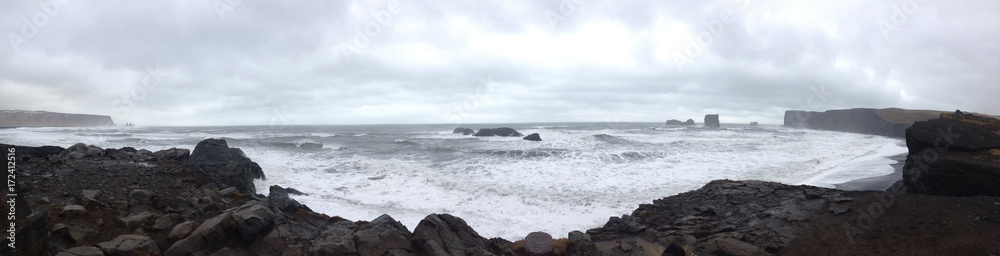 Stormy coast at Kirkjufjara beach