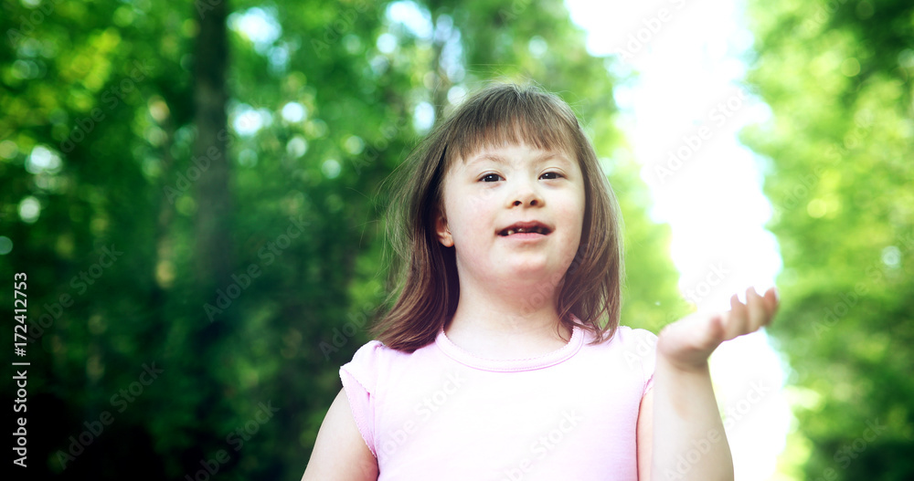 Portrait of beautiful little girl with down syndrome Portrait of beautiful little girl with down syndrome