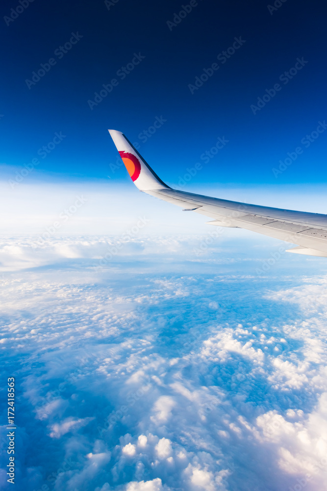 the view from the window of a passenger plane the view from the window of a passenger plane