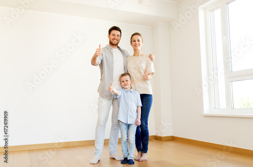 happy family with child moving to new home