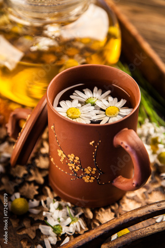 Cup of chamomile tea © George Dolgikh