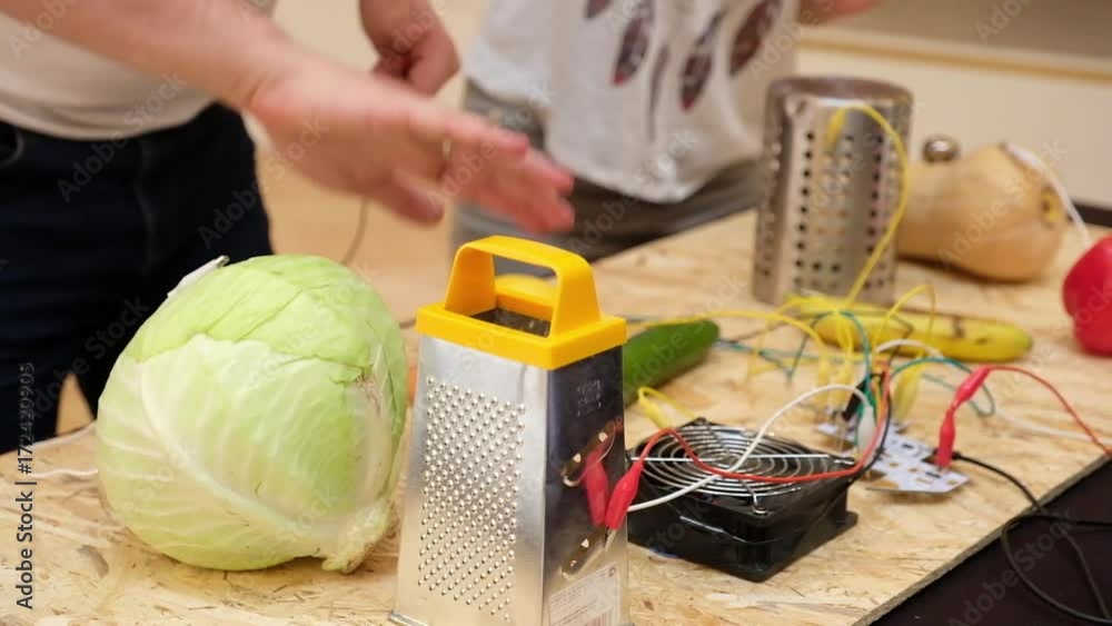 Sound design. Playing vegetables and various items as if they are musical instruments