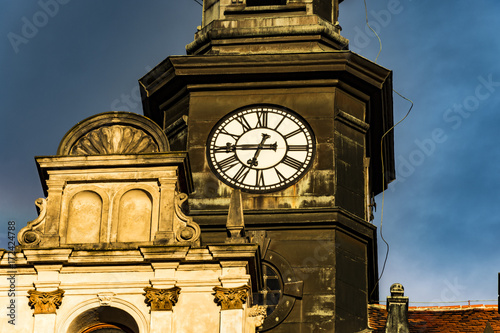 Tower of Česká Lípa's guildhall in the Czech republic. Tower with clock. Cloudy day. photo