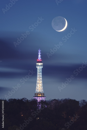 Photography Petrin lookout tower (Petrinska rozhledna) in Prague at night, fantastic landsca