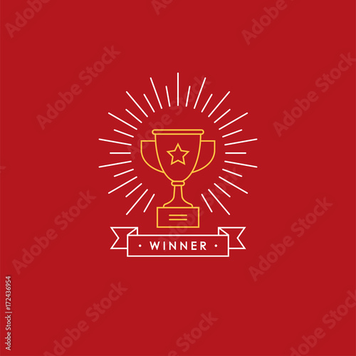 Linear emblem with winner cup, sunburst and ribbon. photo