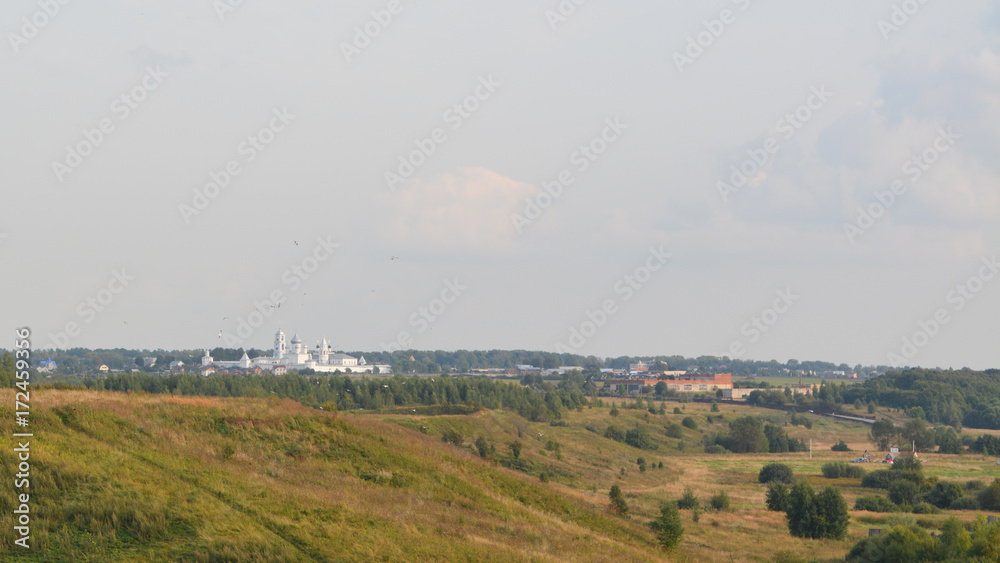 Landscape with Orthodox Church in the distance. Russia: common landscape. Landscape with Orthodox Church in the distance. Russia: common landscape.