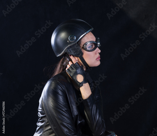 studio portrait of a biker girl