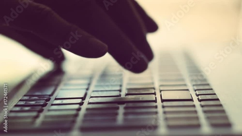 Woman typing on laptop