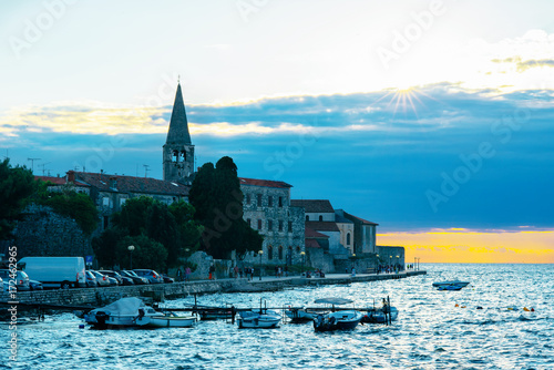 Sunset on the seashore. City View Walk along the seafront photo