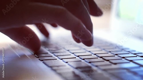 Woman typing on laptop