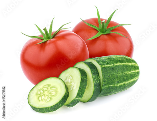 Isolated vegetables. Fresh tomato and cucumber isolated on white background photo