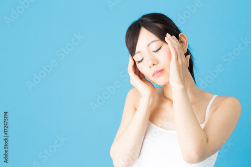attractive asian woman beauty image isolated on blue background