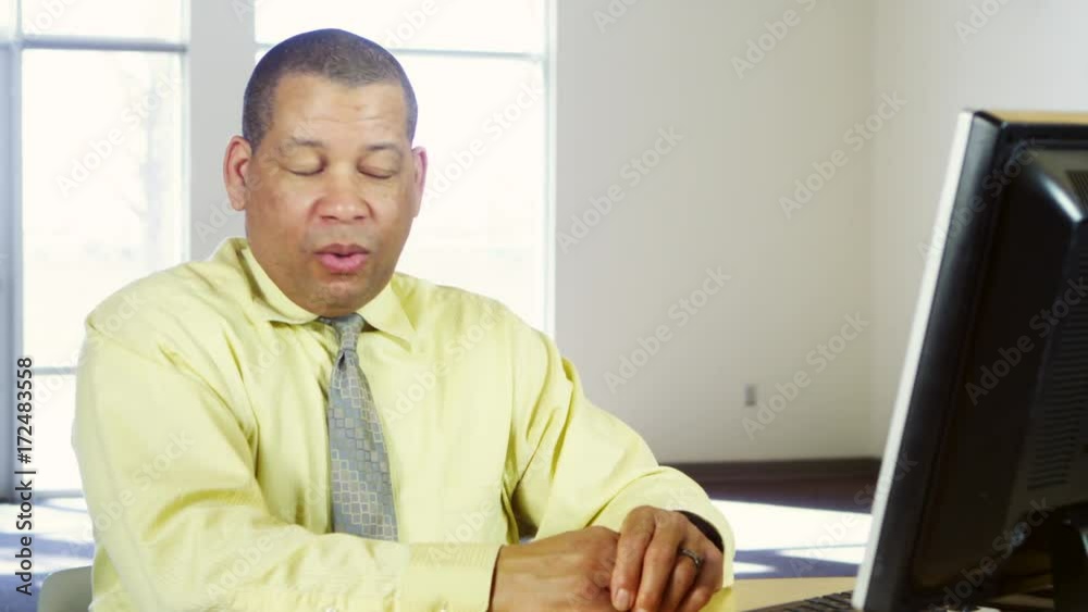 Business man talking to coworker at work Business man talking to coworker at work