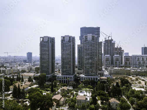 TEL AVIV, ISRAEL Cityscape with towers of Azrieli Center and Sarona area in Tel Aviv, . Azrieli center is the main landmark of Tel Aviv. Old and New Architecture in Tel Aviv - Old and modern bui