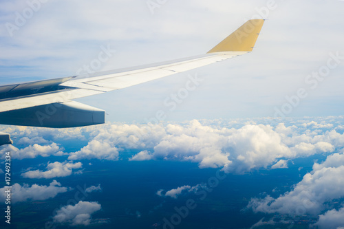 Wing aircraft against the sky