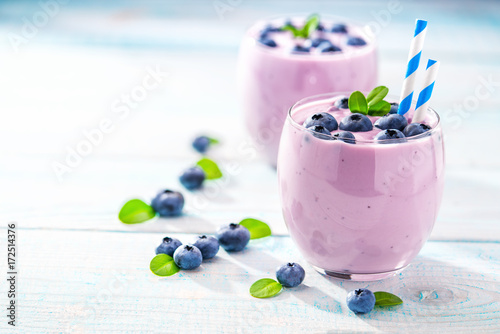 Blueberry yogurt..smoothie in glass jar, copy space