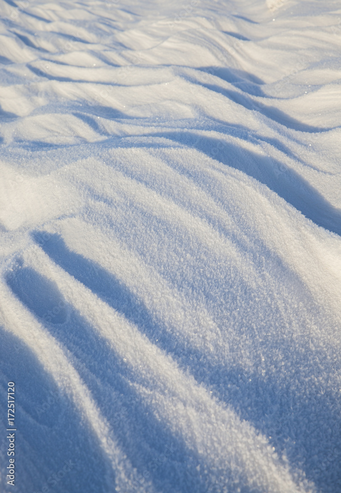 Snowdrifts, a field in winter