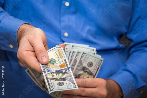 Handing Over a Hundred
