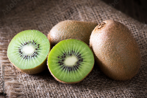 Kiwi fruit on wooden background