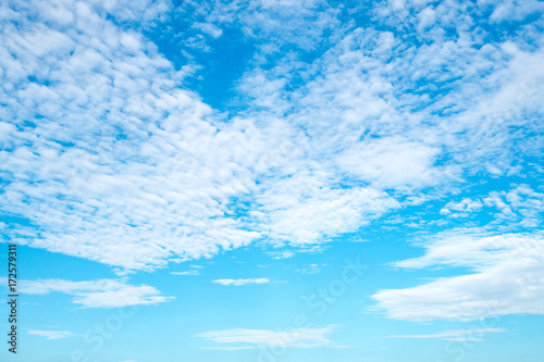 Beautiful blue sky with clouds on sunshine day. Copy space.