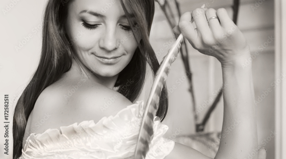 Obraz premium woman's portrait ,Beautiful girl ,portrait ,black and white photo ,a pen,a beautiful photo