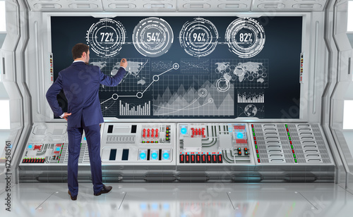 Businessman using graph screens interface on a board 3D rendering