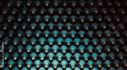 Obraz na płótnie stacked up wine bottles in the cellar w salonie
