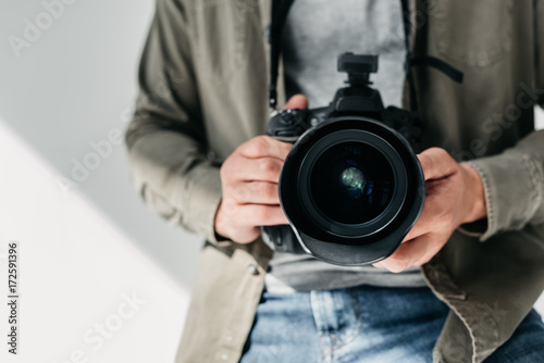 photographer with digital photo camera