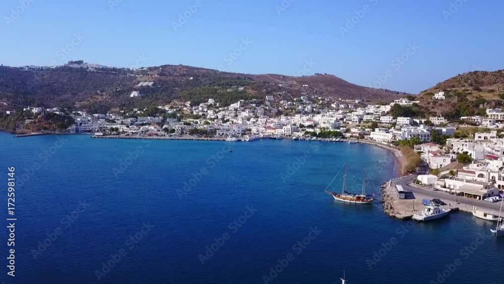 August 2017: Aerial drone video of famous port of Skala, Patmos island, Dodecanese, Greece August 2017: Aerial drone video of famous port of Skala, Patmos island, Dodecanese, Greece