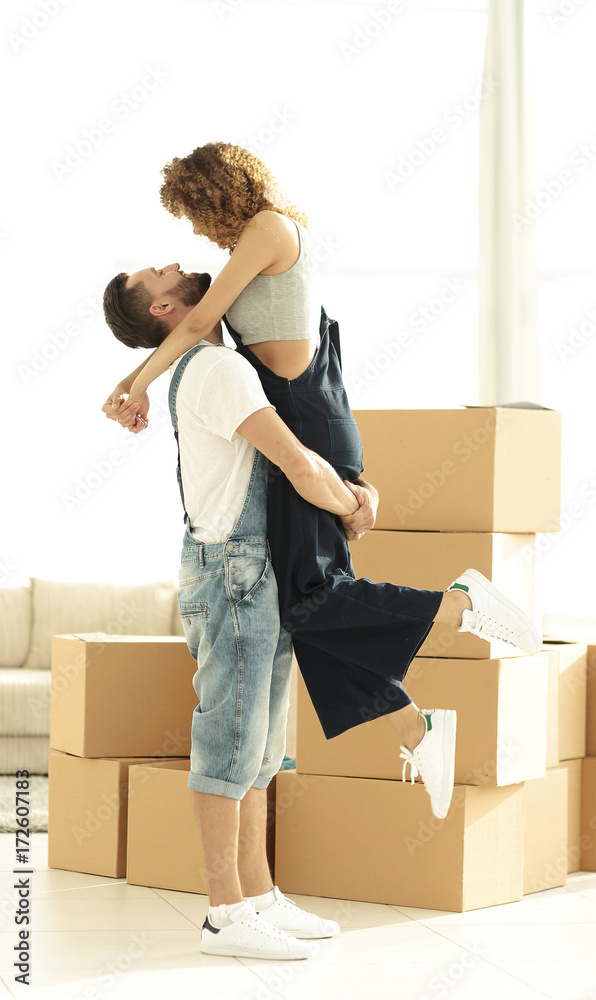 Portrait of a happy couple moving to a new house Portrait of a happy couple moving to a new house