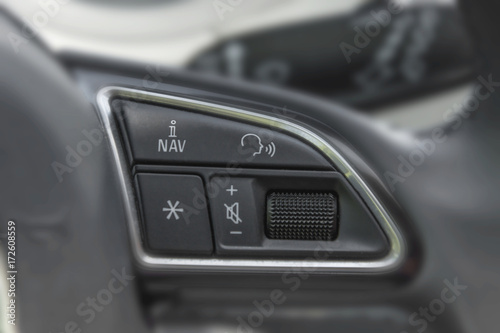 Steering wheel commands in modern luxurious car © bennian_1