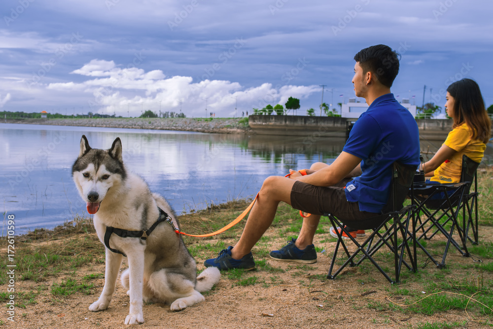 Young couple enjoy camping outdoors at lake,relaxing and holiday concept. Young couple enjoy camping outdoors at lake,relaxing and holiday concept.
