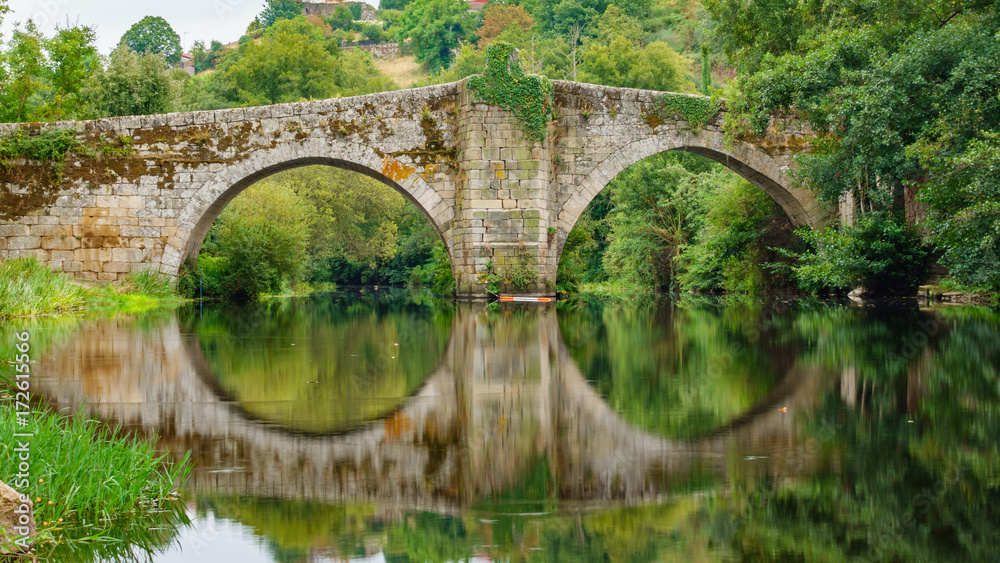 River and medieval bridge in Allariz, Orense, Spain