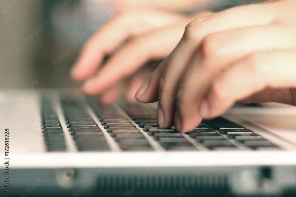 Woman typing on laptop Woman typing on laptop