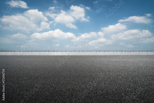 asphalt road and blue sky. © hallojulie