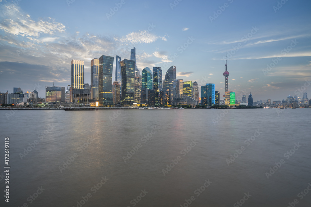 shanghai cityscape and skyline against blue sky
