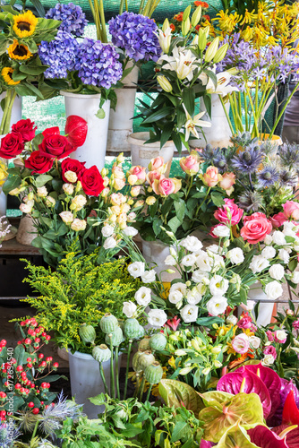 Background of colorful flowers for sale in a market
