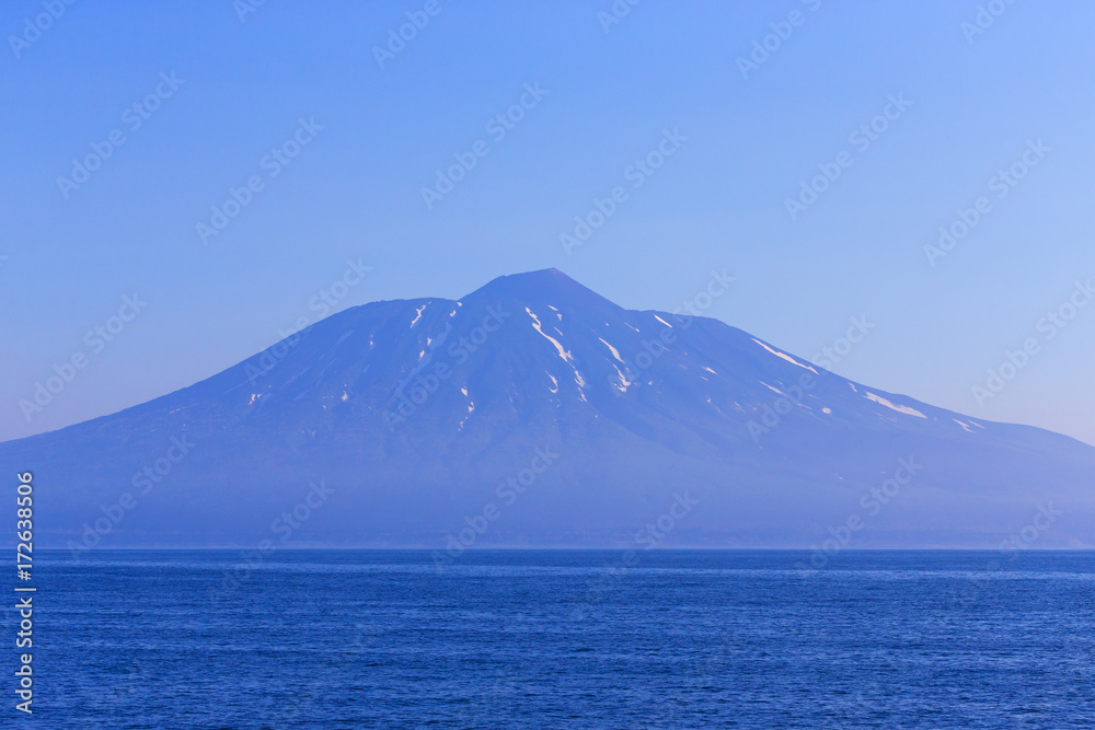 View on a Kunashir island with volcano Tyatya View on a Kunashir island with volcano Tyatya