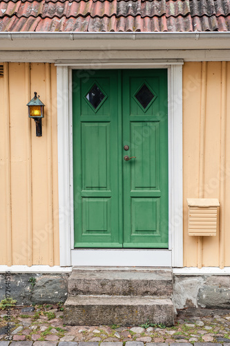 Beautiful vintage wood house and doors in scandinavian style.