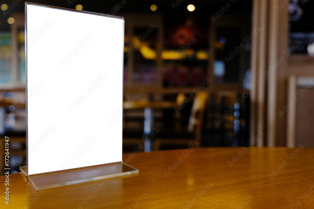 Mock up Menu frame standing on wood table in Bar restaurant cafe. space for text. Mock up Menu frame standing on wood table in Bar restaurant cafe. space for text.