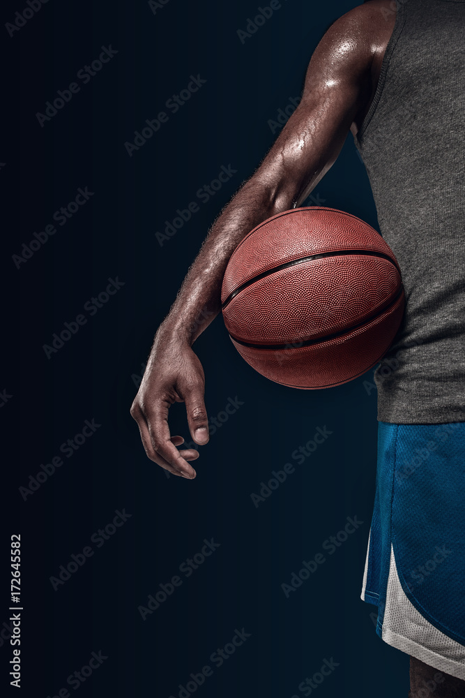 The hands of a basketball player with ball The hands of a basketball player with ball
