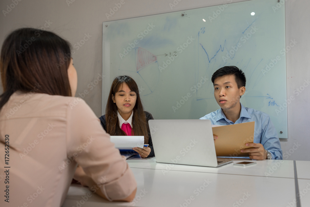 Interviewer asking candidate about her working experience Interviewer asking candidate about her working experience
