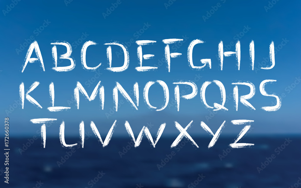 Fototapeta premium Brush Font Bold Letters on Sea Background