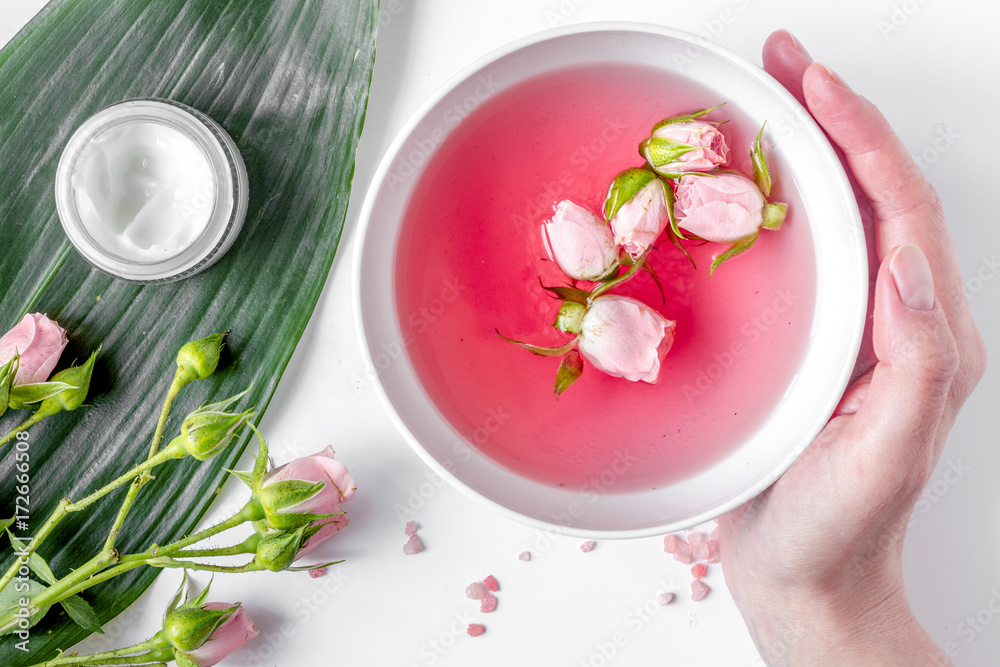 salt and cream for nail care in spa top view