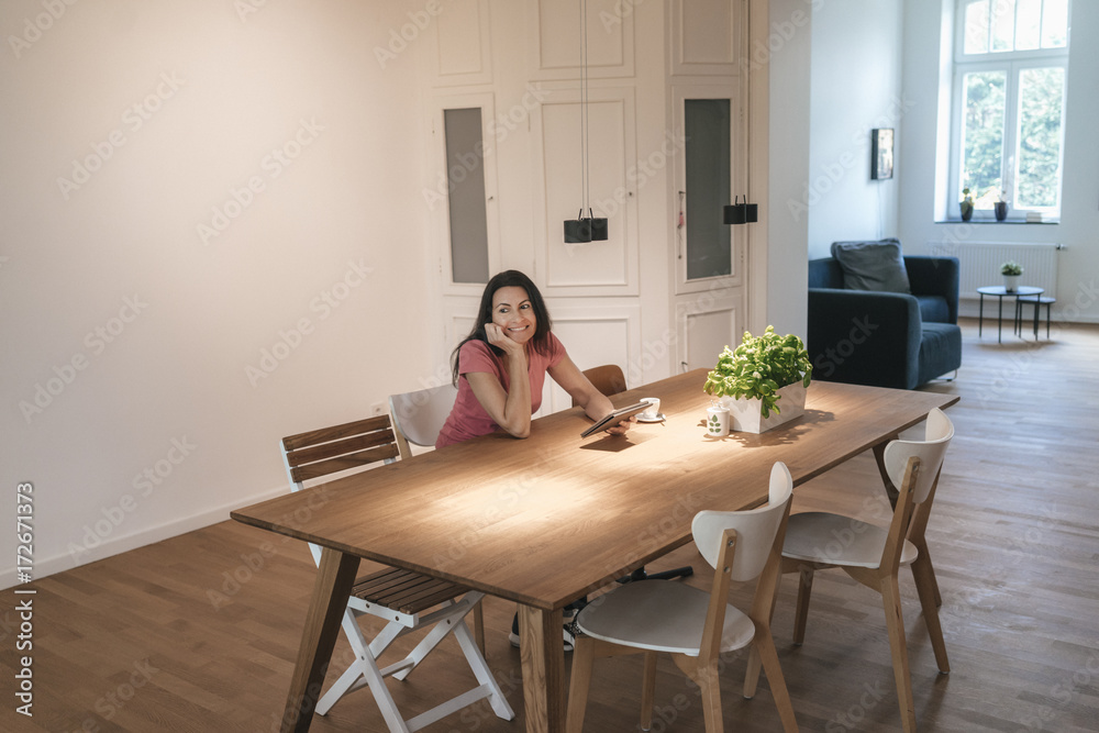 Woman using tablet at home Woman using tablet at home