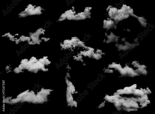 Set of white fluffy clouds isolated on black background for design overlay