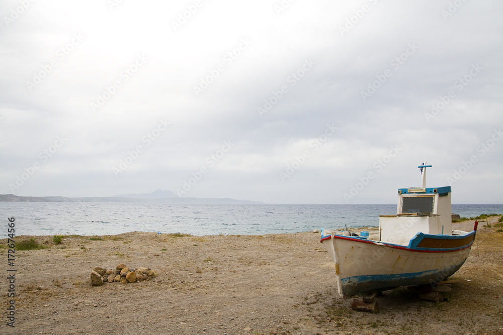 Naklejka premium old fisherman boat on the ground