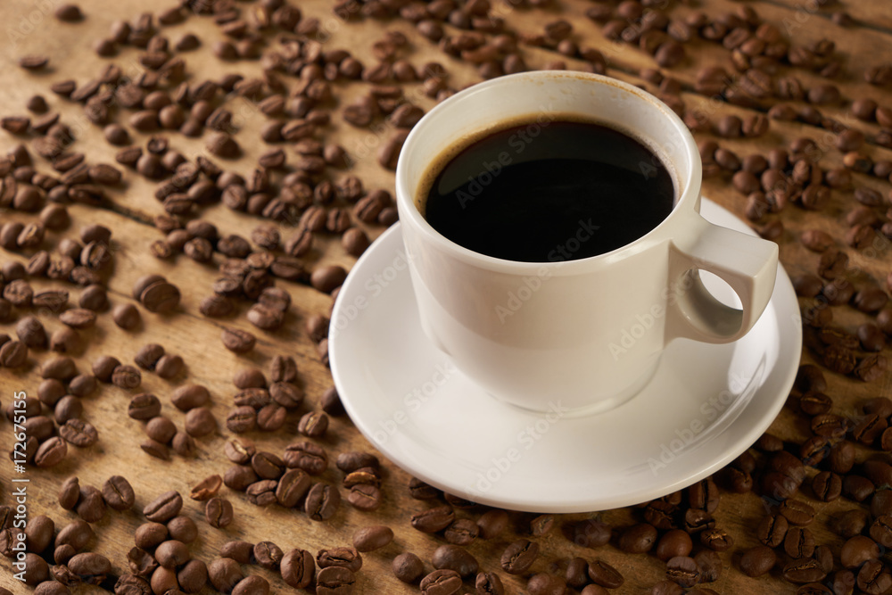 Fototapeta premium Coffee cup and coffee beans