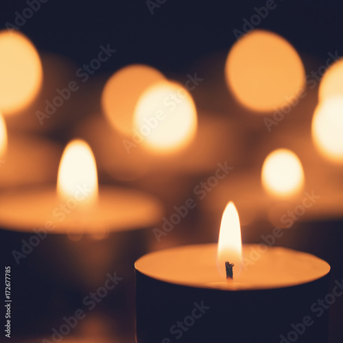 burning candles with beautiful out of focus