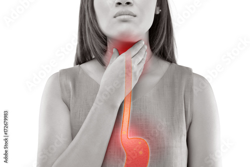 Woman Suffering From Acid Reflux Or Heartburn-Isolated On White Background photo